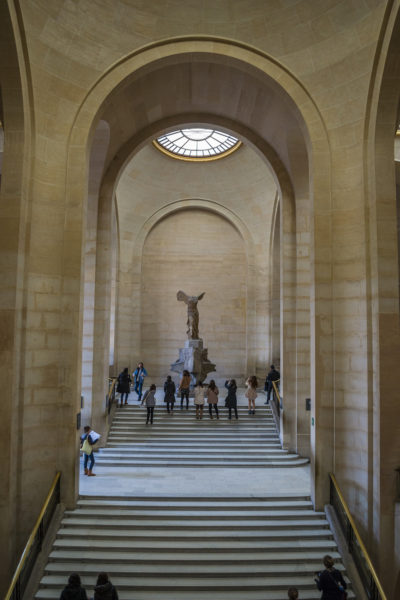 The Winged Victory of Samothrace can be found at the top of the stairs inside the Louvre in Paris.