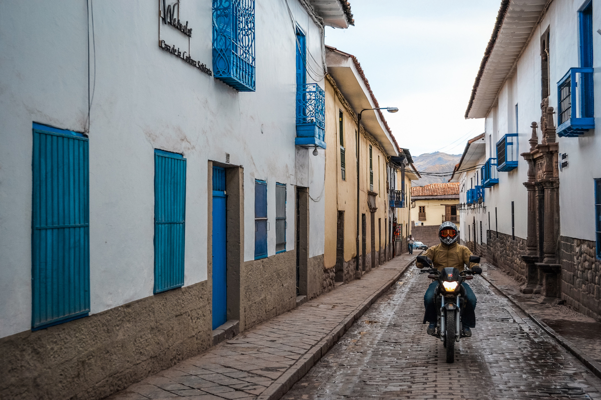 Riding motorcycles through the streets of Peru.