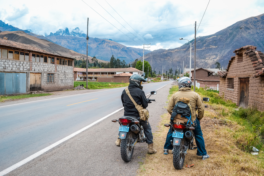 Motorcycling to the Sacred Valley in Peru through a small town. 