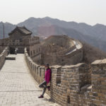 Standing on the Great Wall of China.