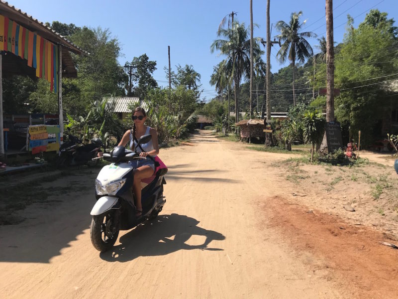Riding a motorbike in Thailand.