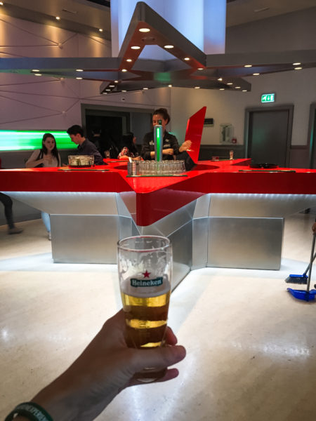 Drinking beer at the Heineken Experience.