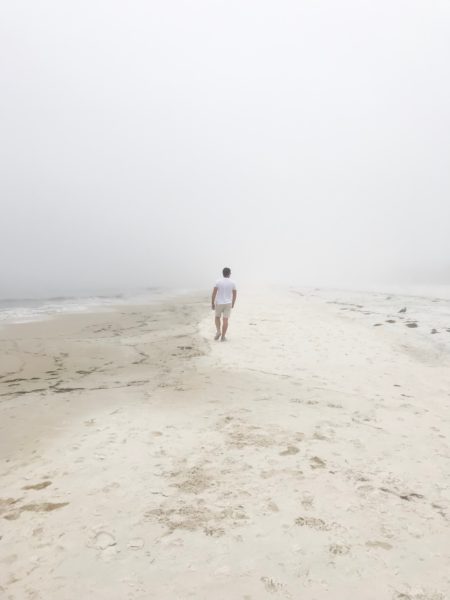 The beach at alligator point, Florida on a very foggy day.