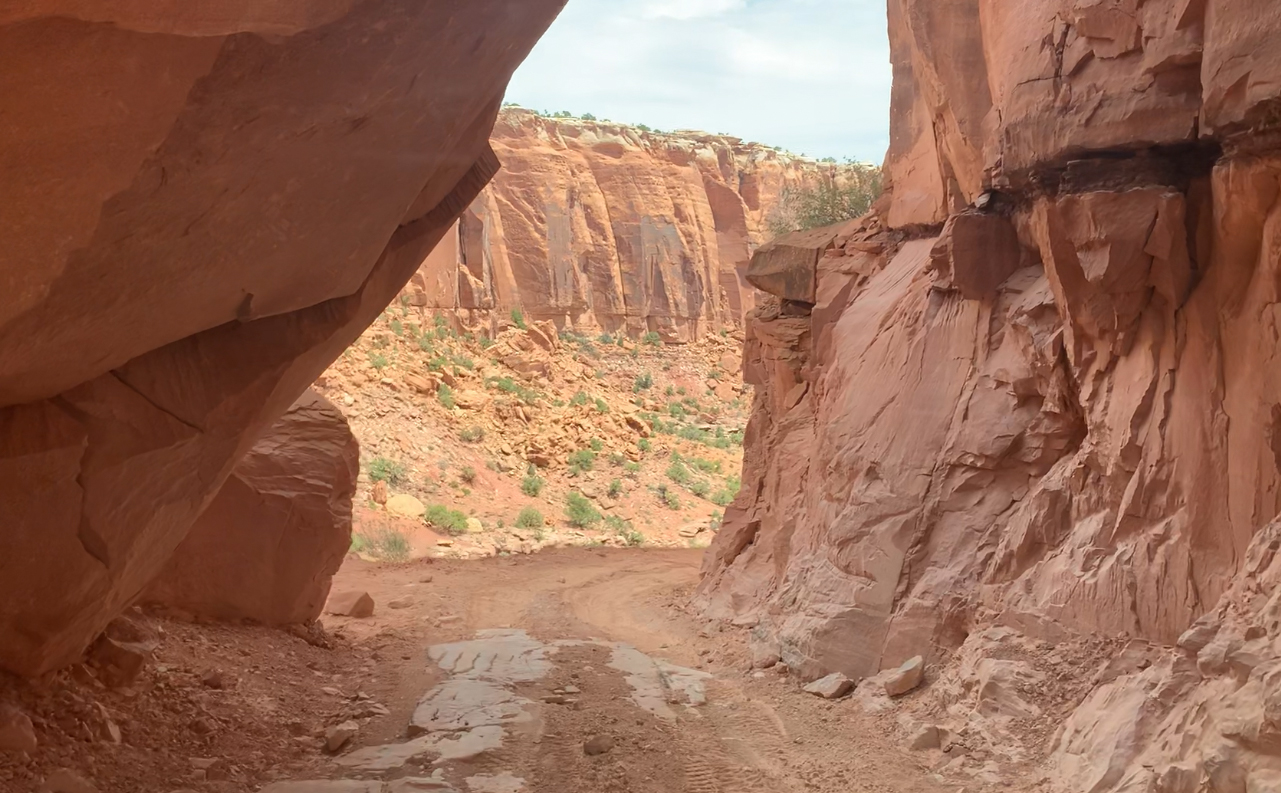 This off-roading trail in Moab takes you right underneath a boulder!