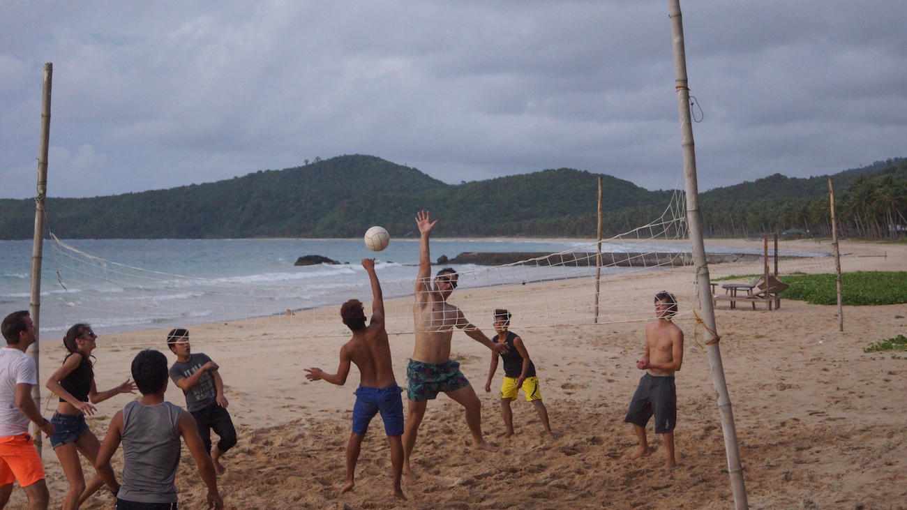 Playing beach volleyball in El Nido--a place to add to your Philippines travel guide!