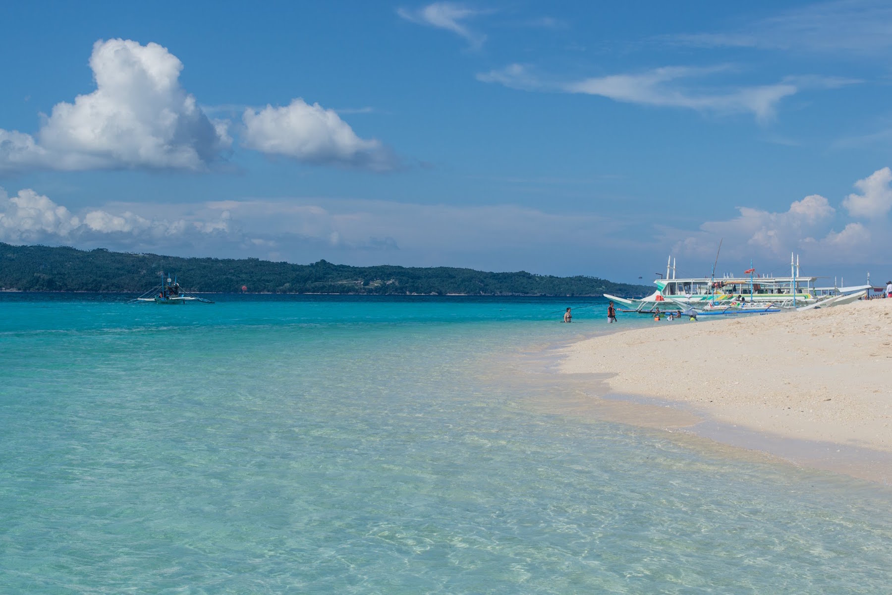 Boracay island should definitely be on your Philippines travel guide--the turquoise water is beautiful!