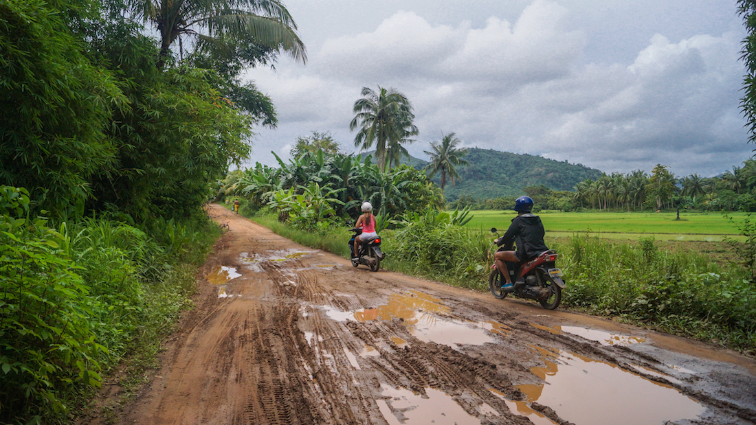 Philippines travel guide: Riding through the Philippines countryside on motorbikes.