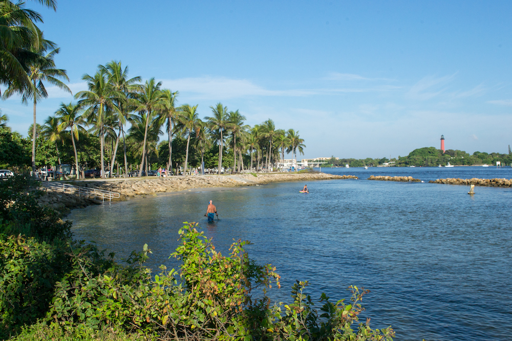 Dubois Park swimming has a view of the lighthouse from across the Jupiter inlet. 