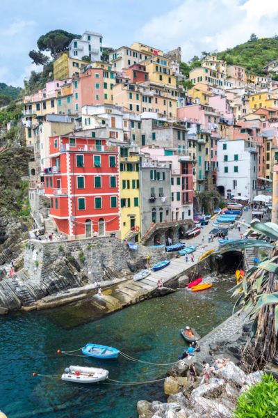 Bucket list ideas: explore the colorful coastal towns of Cinque Terre in Italy. 