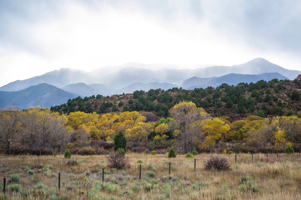 Garden of the Gods pictures: you'll see beautiful layered mountains and in the spring, lots of colorful trees.