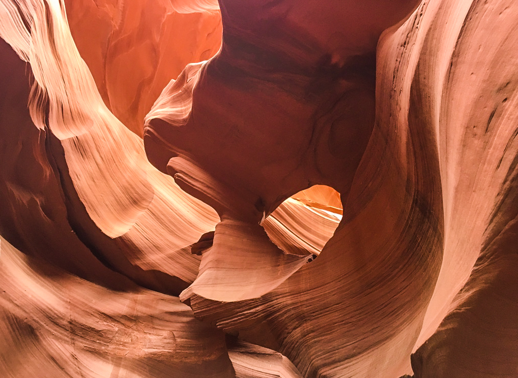 Upper vs lower Antelope Canyon--this one is the swirling walls of the lower canyon!