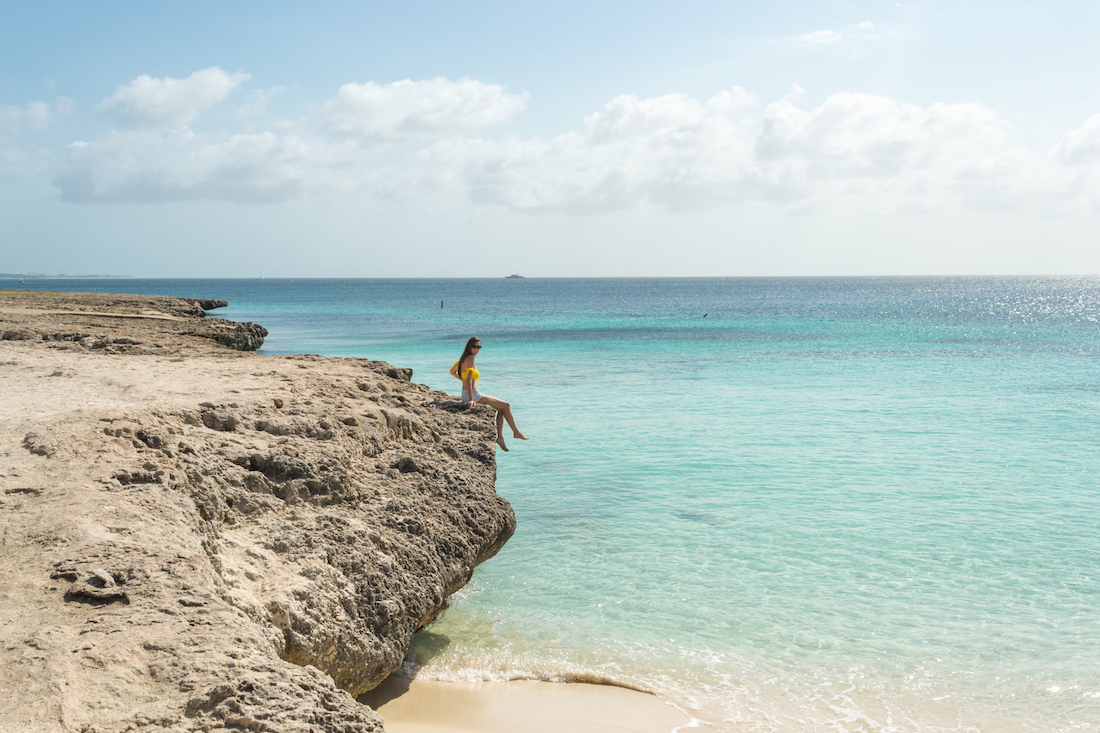 Aruba vs Curacao: Aruba has a lot of great beach spots like this little cove found on the rocky coast.