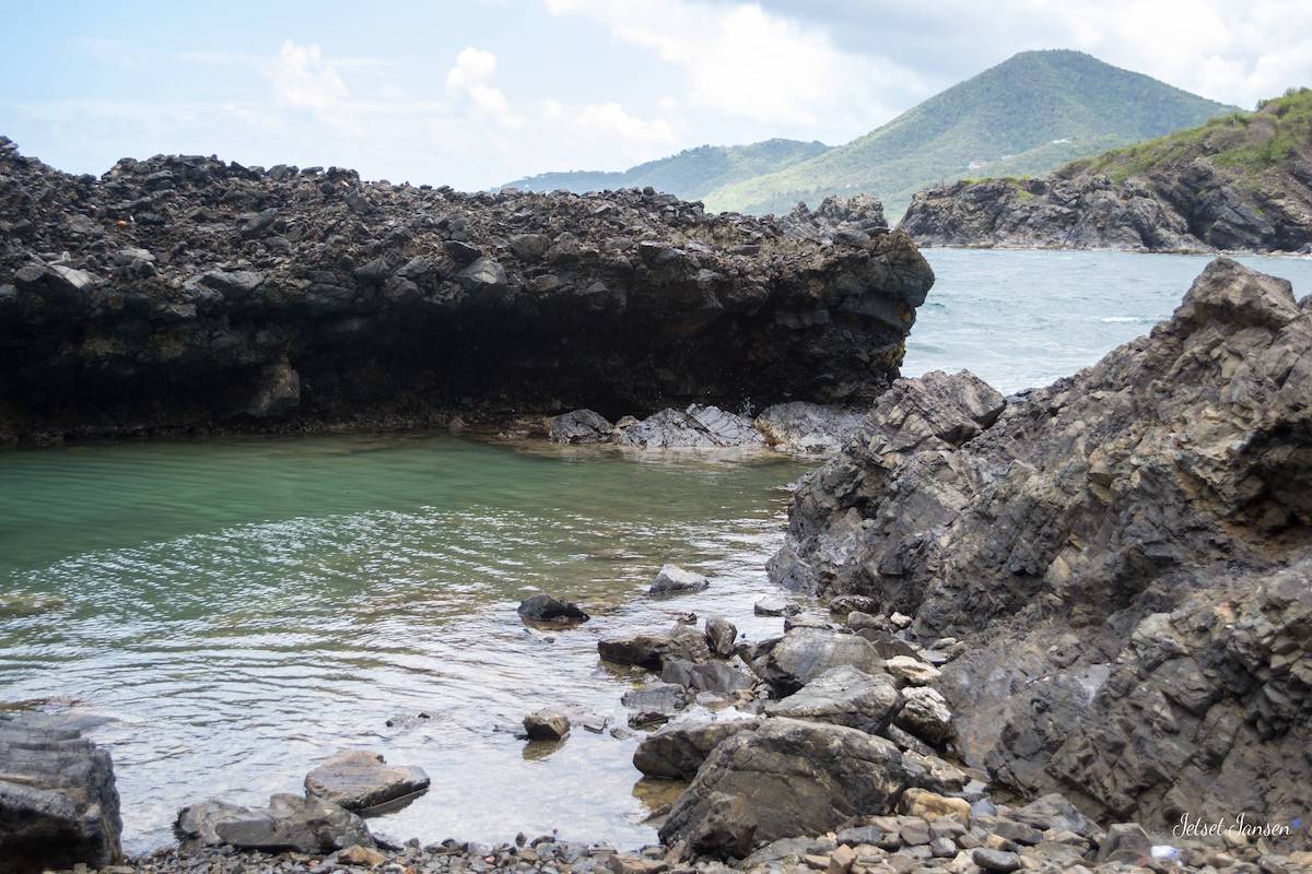 The Annaly Bay Tide Pools in St Croix are tucked away into the rocks on the beach.
