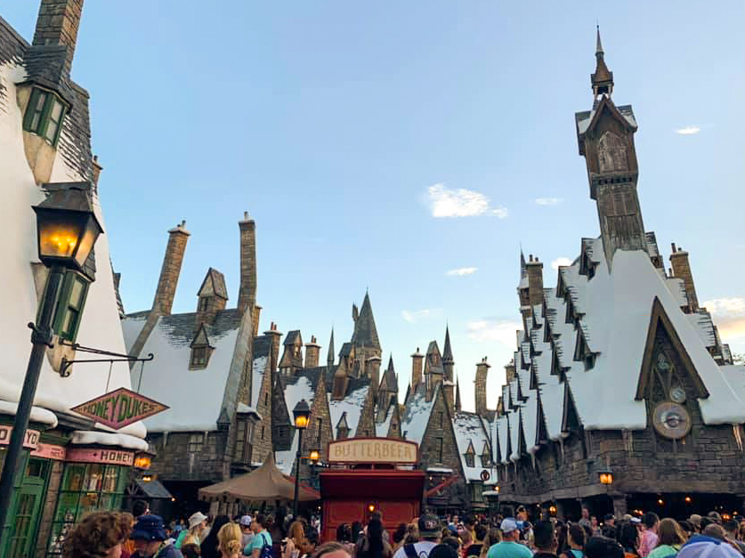 The snow capped town of Hogsmeade in Harry Potter world at Islands of Adventure.