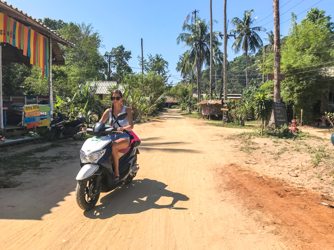 Riding a scooter around Koh Chang Island.