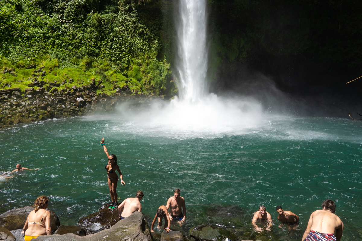 Swimming at a waterfall in Costa Rica.