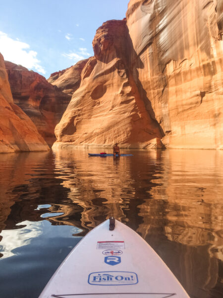 Paddle boarding in Lake Powell through the canyons.