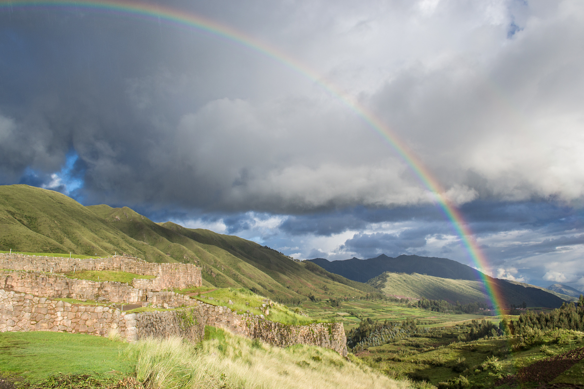A rainbow over the Puka Pukara ruins in Cusco, Peru.