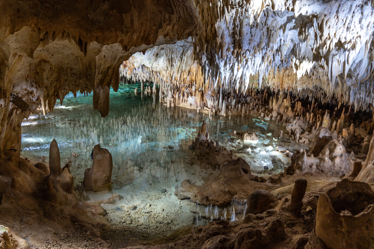 Exploring the Cayman Crystal Caves in Grand Cayman. 