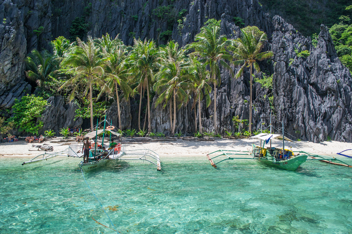 Why visit the Philippines?  For boat trips to turquoise water and limestone formations!