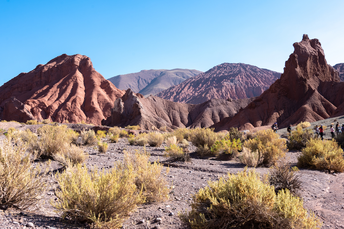 Valle de Arcoiris or Rainbow Valley is a short hike through colorful rock formations in the Atacama Desert.