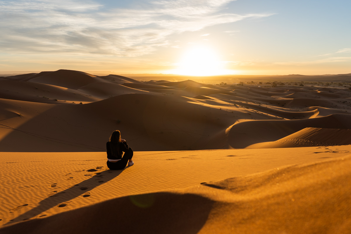 The sunrise after camping in the Sahara Desert in Morocco.
